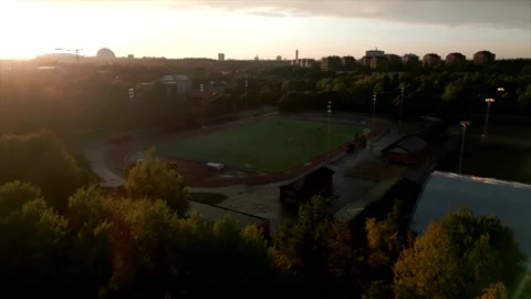 Flying over a Soccerball Game with backlight 4K Stock Footage 287887151