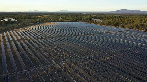 Flying over solar farm on late afternoon near Bend, Oregon Stock Footage 160931942