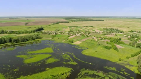 Flying over the spring river Stockbeeldmateriaal 39591686