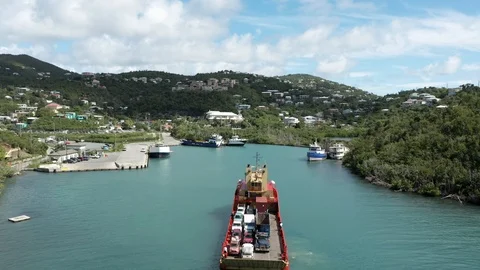 Flying over st. john usvi with ferry v3 Stock Footage 124300086