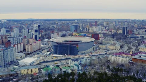 Flying over the stadium in the city during football championship match. Stock Footage 107793885