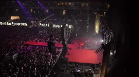 Flying over the stage and spectators at the concert. 스톡 동영상 48702254