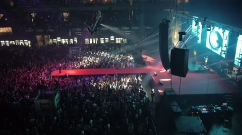 Flying over the stage and spectators at the concert. Stockbeeldmateriaal 48702344