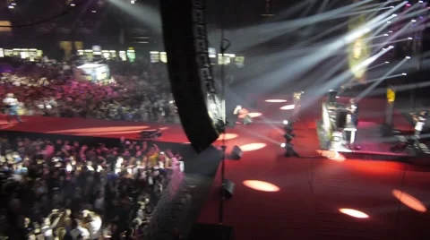 Flying over the stage and spectators at the concert. Stockbeeldmateriaal 48702367
