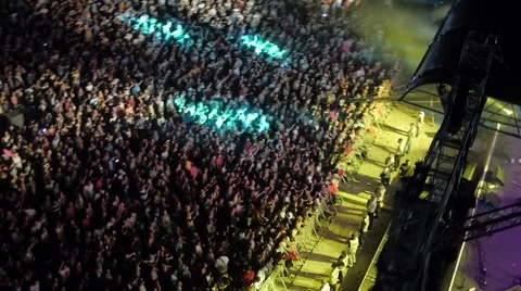 Flying over the stage and spectators at the concert. Stock Footage 58750680
