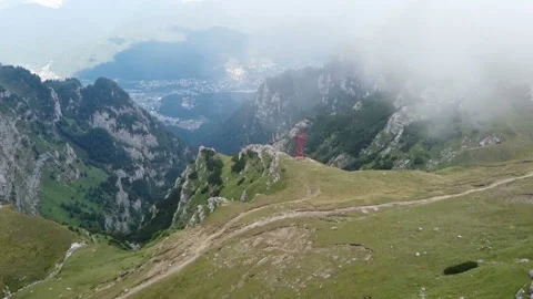 Flying over steep cliffs in the Carpathian mountains , Romania Stock-Footage 137936839