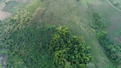 Flying over steep hill mountain Stock Footage 104152396