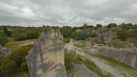 Flying over stone-pit and forest 스톡 동영상 157999278
