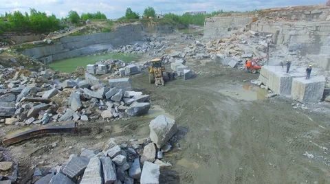 Flying over a stone quarry Vídeo Stock 64975331