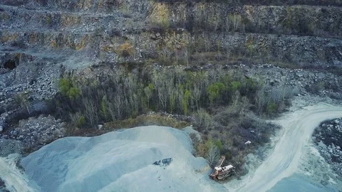 Flying over a stone quarry Stock Footage