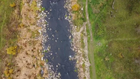Flying over a stream, a view from a drone Stock Footage 166447626