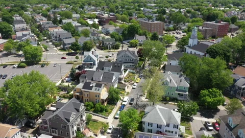 FLYING OVER SUBURBS IN SPRING. Stock Footage 195881741