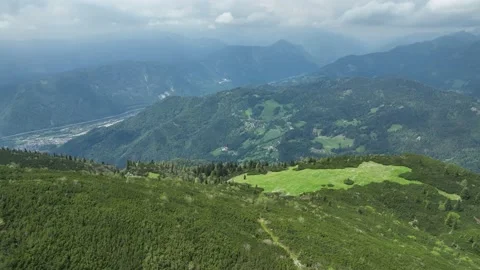 Flying over the summer mountains and hills Stock Footage 196190102