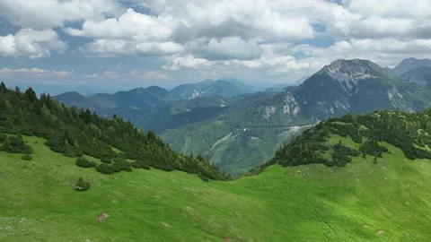 Flying over the summer mountains and hills Stock Footage 196203090