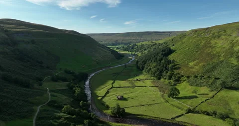 Flying over sunny Swaledale Stock Footage 220146798