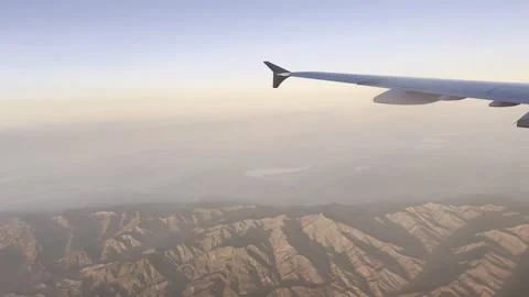 Flying over sunset mountains Stock Footage 297424693