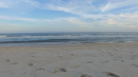 Flying Over the Surf, Ocracoke, NC Stock Footage 128384479