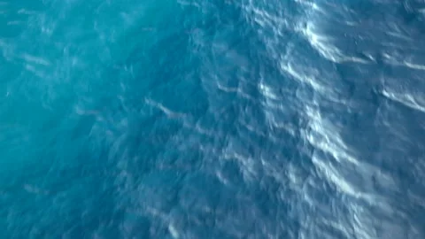 Flying over the surface of the blue sea. Stock Footage 138696649