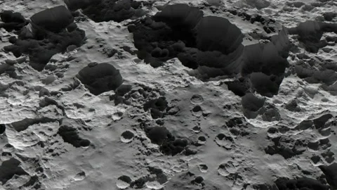 Flying over the surface of a moon-like Planet. High quality seamless loop. Stock Footage 154649474
