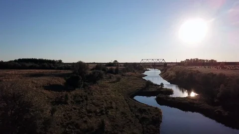 Flying over the surface of a small river Stock Footage 97028100