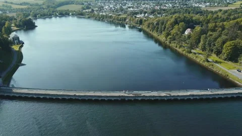 Flying over the surface of the water in the reservoir. Stock Footage 287096033
