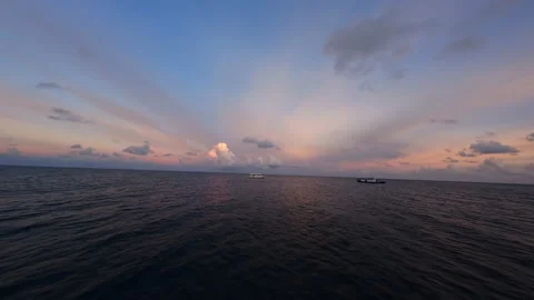 Flying over the surface of the water at sunset. FPV Drone Video. Stock Footage 238858201