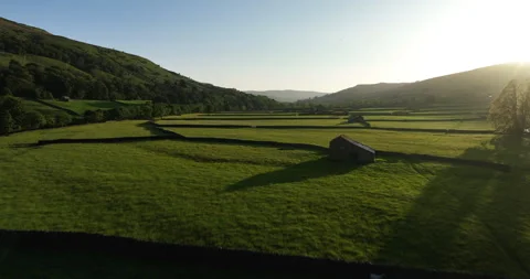 Flying over Swaledale at sunset Stock Footage 282916908