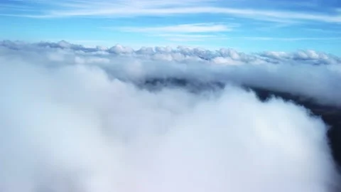 Flying over thick white clouds Stock-Footage 221789075