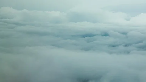 Flying over the top of clouds Stock Footage 123768362
