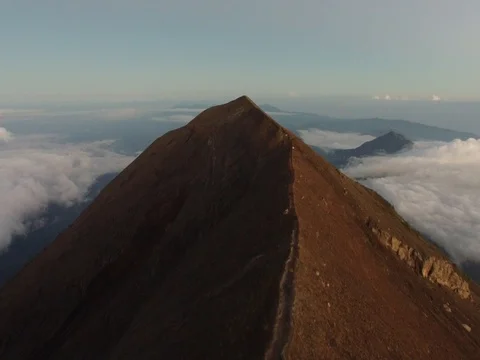 Flying over a trail at crest of Agung volcano in Bali, Indonesia (aerial video) Stock Footage 80583228