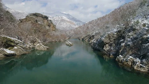 Flying over the transparent winter mountain river Moraca, Montenegro Stockbeeldmateriaal 86538153