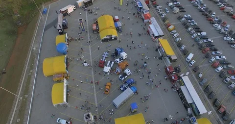 Flying over trucks at the fair Stock Footage 106893554