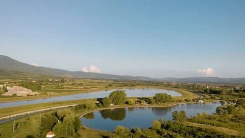 Flying over two small lakes 스톡 동영상 94049846