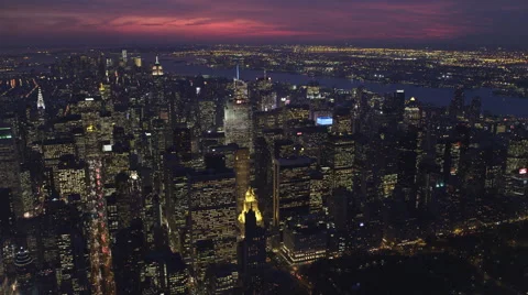 Flying over Upper Manhattan at dusk with Central Park in foreground; looking Stock Footage 59529735