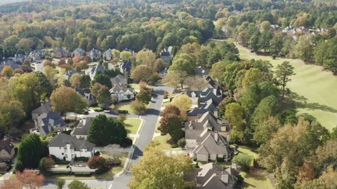 Flying over an upscale subdivision in suburbs of Atlanta Vídeo Stock 164626998