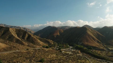 Flying over the Valley close to the mountains Stock Footage 123685134