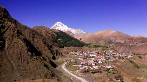 Flying over a valley in georgia Stock Footage 233372910