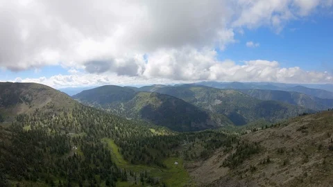 Flying over the valley in mountains Stock Footage 121696713