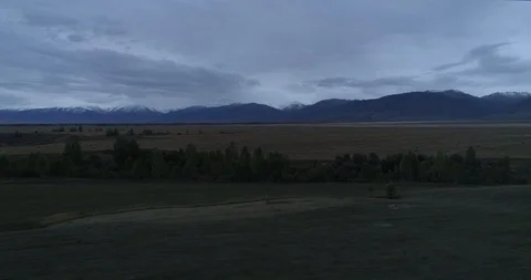 Flying over the valley at sunset in the mountains of Altai, 4k Stock Footage 108028681