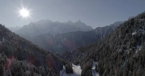 Flying over a valley in winter time, Switzerland Stock Footage 92535817