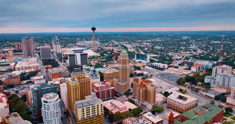 Flying over the vast cityscape of modern San Antonio, Texas, USA. Approaching Stock Footage 325614971
