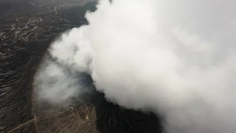 Flying over the vent of a volcano on an FPV drone Stock Footage 238373818