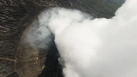 Flying over the vent of a volcano on an FPV drone Stock Footage 238373925