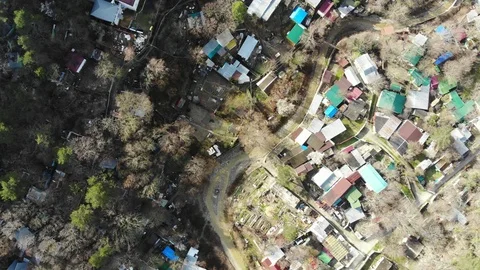 Flying over the village. Flying over the village in the mountains. Stock Footage 124755501