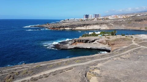 Flying Over Volcanic beach And Waves, Aerial Shot in Tenerife coast Stock Footage 124930864