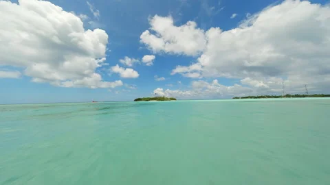 Flying over the water surface in the Maldives Stock Footage 239337744