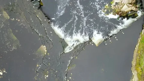 Flying over a waterfall, a view from a drone Stock Footage 166447682