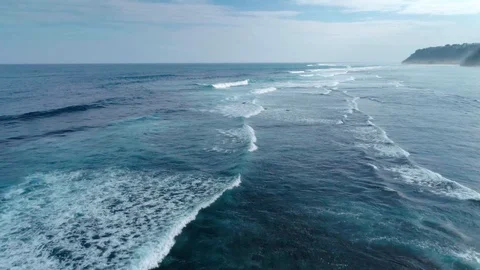 Flying over the waves of a beautiful and powerful ocean Stock Footage 109478013