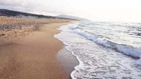 Flying over waves with the drone Stock Footage 80610357