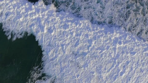 Flying over the Waves of the Ocean to the Sea Aerial view 4K Stock Footage 126477386